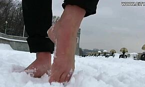 Hot Bitch Strolls Barefoot On Snow – Provocative!