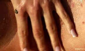 Stunning Blonde Posing Seductively on a Sandy Beach Shore