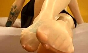 Pantyhose-Clad Babe Adrenalynn Teasing with Her Feet in Skirt