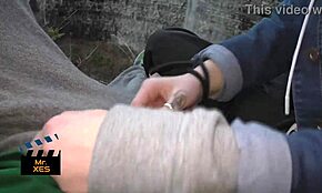 blonde gives outdoor blowjob near waterfall, almost caught