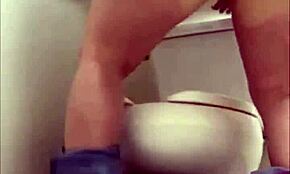 Brunette MILF Babe Sniffs Her Panties While Peeing And Humps Toilets In Public Bathroom