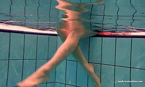 Yo, check Duna Bultihalo’s big tits underwater in that red dress! 😍