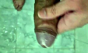 This twink sucks penis in the shower with neighbors nearby