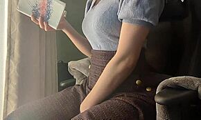 Big-breasted girl gets aroused reading, touches herself