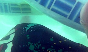 a blonde with blue eyes gets creampied underwater while using dildo