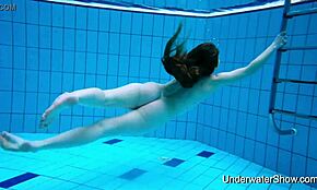 Wow, this sexy girl flaunts her stunning young body underwater in pool!