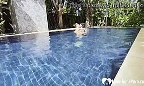 hot babe swims naked and grabs my cock by the pool