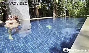 hot babe swims naked and grabs my cock by the pool