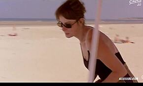 Clotilde Courau and Charlotte Rampling give handjobs in nude scene.