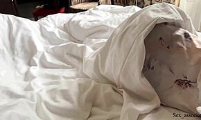 Stepmother and son share a hotel bed