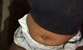 The next door ebony milf flashed her saggy tits in shorts