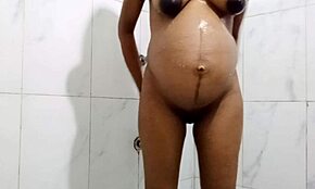 I want my pregnant stepmom to take it in the ass while bathing