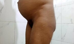 I want my pregnant stepmom to take it in the ass while bathing