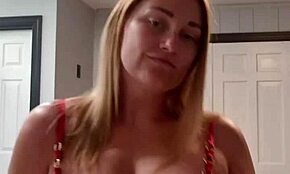 Wife teases with seductive strip to music