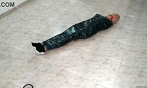 Duct Tape Mummified Girl in Pantyhose Hooded and Ball Gagged by Sadistic Women