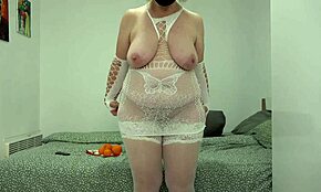 Chubby milf teases with fruit in her deep private spot at home