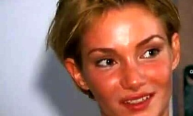 Hey, wanna see this tanned redhead take two huge cocks in a garage threesome?