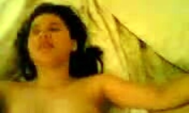 Hey, wanna see this dark-haired teen with a hairy pussy getting pounded on a bed?