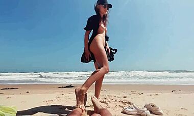 wow, teen girl stroking herself on nude beach while guy cums! 🌊