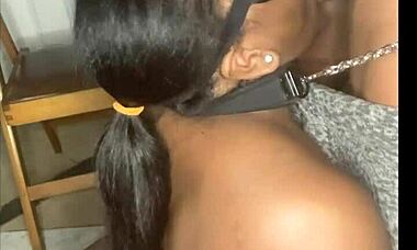 Thick ebony amateur deepthroats and gets fucked while wearing fishnets and leash