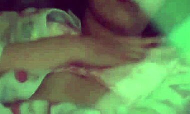 Look at this Asian babe rubbing her hairy muff on hidden cam