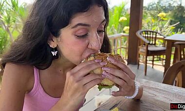 She asks, 'Want to see me eat a burger with cum on my face?'