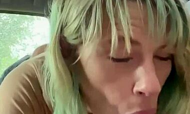 A real hooker enjoys sucking cock in the car's backseat, draining every drop of cum.