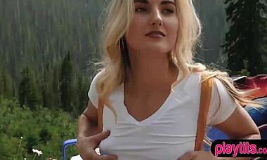 beautiful blonde babe strips outdoors in the alps